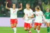 Julia Grosso of Canada (left) celebrates a goal against Ireland with teammates Quinn (centre) and Adriana Leon during their Group B match at the FIFA Women's World Cup in Perth, Australia, Wednesday, July 26, 2023. THE CANADIAN PRESS/James Worsfold
