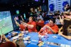 People celebrate a Canada goal during the FIFA Women's World Cup soccer watch party for the Canada vs. Ireland game, at Real Sports in Toronto on Wednesday, July 26, 2023. THE CANADIAN PRESS/Cole Burston