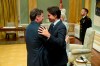 Prime Minister Justin Trudeau hugs Minister of Public Safety, Democratic Institutions and Intergovernmental Affairs Dominic LeBlanc during a cabinet swearing-in ceremony at Rideau Hall in Ottawa on Wednesday, July 26, 2023. THE CANADIAN PRESS/Adrian Wyld