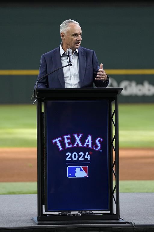 Major League Baseball Commissioner Rob Manfred makes comments before the unveiling of the 2024 All-Star game logo, Thursday, July 20, 2023, in Arlington, Texas. The MLB All-Star Game has grown into a truly Texas-sized event since the last time the Rangers hosted the midsummer classic. The countdown is on for 2024 game on July 16, and all of the activities around the game. (AP Photo/Tony Gutierrez)