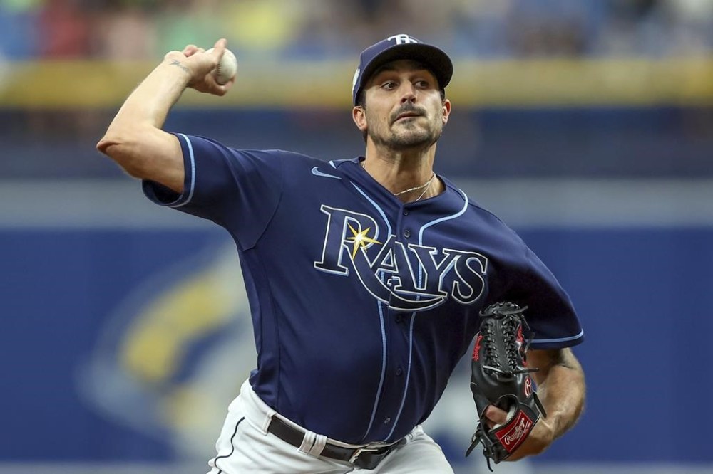 Tampa Bay Rays starting pitcher Zach Eflin throws against the Miami Marlins during the first inning of a baseball game Wednesday, July 26, 2023, in St. Petersburg, Fla. (AP Photo/Mike Carlson)