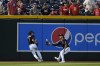 Arizona Diamondbacks' Alek Thomas catches fly out hit by St. Louis Cardinals left fielder Alec Burleson during the fourth inning of a baseball game as Corbin Carroll (7) looks on, Wednesday, July 26, 2023, in Phoenix. (AP Photo/Matt York)