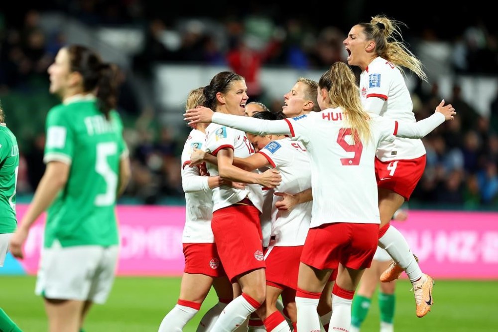 Canada players celebrate a second half goal by Adriana Leon against Ireland during their Group B match at the FIFA Women's World Cup in Perth, Australia, Wednesday, July 26, 2023. THE CANADIAN PRESS/James Worsfold