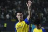 FILE - Cristiano Ronaldo reacts during his official unveiling as a new member of Al Nassr soccer club in in Riyadh, Saudi Arabia, Tuesday, Jan. 3, 2023. Cristian Ronaldo’s Saudi Arabian club Al Nassr will have its FIFA ban on registering new players lifted when it settles a debt with Leicester. (AP Photo/Amr Nabil, File)
