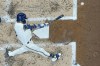 Milwaukee Brewers' Christian Yelich hits a double during the third inning of a baseball game against the Cincinnati Reds Wednesday, July 26, 2023, in Milwaukee. (AP Photo/Morry Gash)