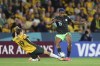 Australia's Katrina Gorry, left, competes for the ball with Nigeria's Rasheedat Ajibade during the Women's World Cup Group B soccer match between Australia and Nigeria in Brisbane, Australia, Thursday, July 27, 2023. Nigeria won 3-2. (AP Photo/Katie Tucker)