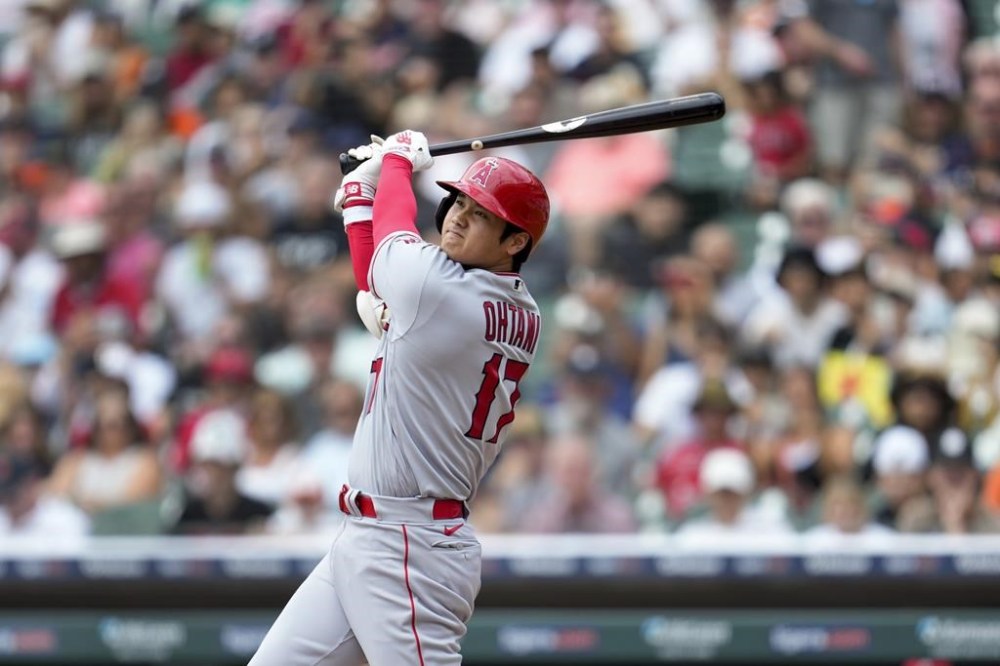 Los Angeles Angels' Shohei Ohtani bats against the Detroit Tigers in the first inning during the first baseball game of a doubleheader, Thursday, July 27, 2023, in Detroit. (AP Photo/Paul Sancya)