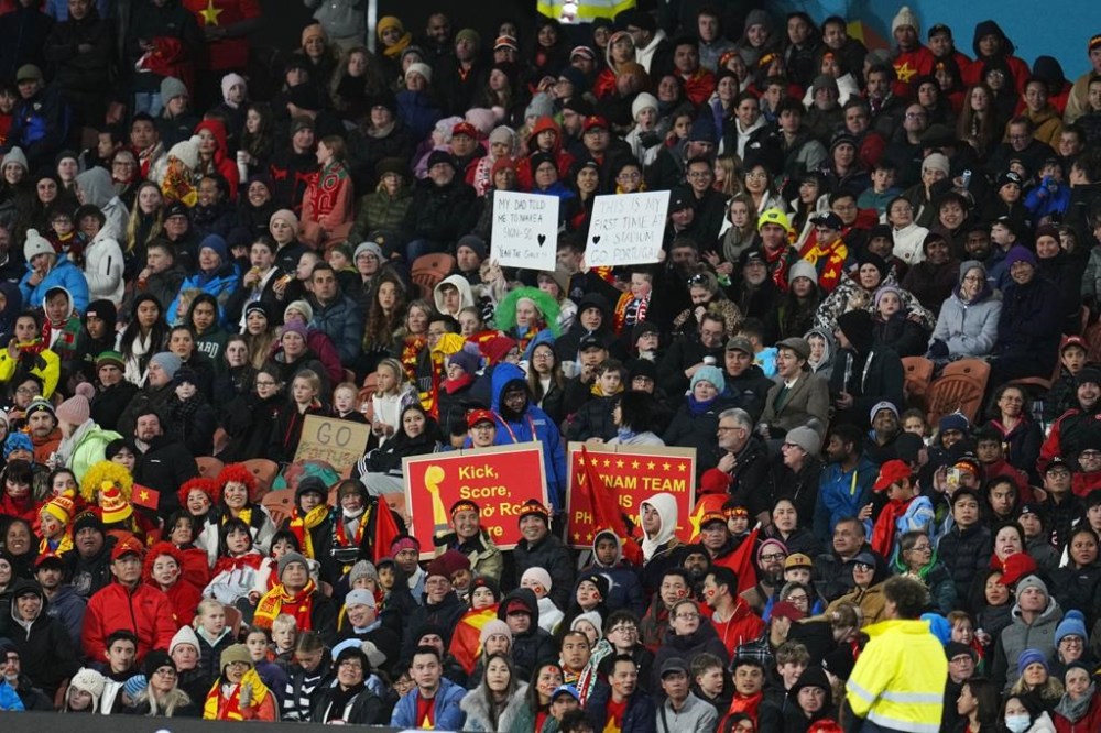 Fans cheer during the Women's World Cup Group E soccer match between Portugal and Vietnam in Hamilton, New Zealand, Thursday, July 27, 2023. (AP Photo/Abbie Parr)