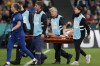 Medical staff stretcher England's Keira Walsh off the pitch after she was injured during the Women's World Cup Group D soccer match between England and Denmark at the Sydney Football Stadium in Sydney, Australia, Friday, July 28, 2023. (AP Photo/Mark Baker)