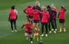 Allysha Chapman, Christine Sinclair and Quinn (front, left to right) take part in a drill during a training session ahead of the FIFA Women's World Cup in Melbourne, Australia, Thursday, July 20, 2023. A day after making headlines for lack of media access, Canada Soccer scheduled a player availability for Saturday. THE CANADIAN PRESS/Scott Barbour