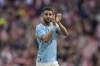 Manchester City's Riyad Mahrez applauds the fans after the end of the English FA Cup semifinal between Manchester City and Sheffield United at Wembley Stadium in London, Saturday, April 22, 2023. Riyad Mahrez is the latest Premier League player to head to Saudi Arabia after signing with Al-Ahli. The Algeria international was a key player in Leicester’s shocking title win in 2016 and then won the league four more times with Manchester City. (AP Photo/Alastair Grant)