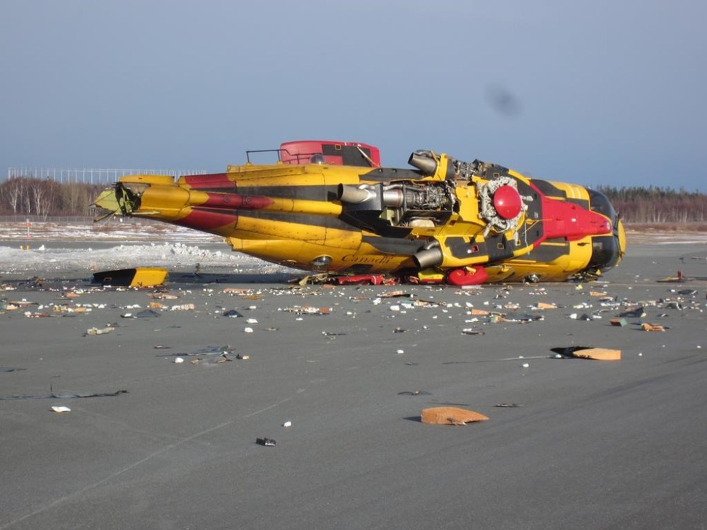 A military search and rescue helicopter is seen after it crashed on March 10, 2022, at the airport in Gander, N.L., in a handout photo. An investigation into a military helicopter crash at the Gander airport last year says the facility has been running with reduced firefighting capabilities since March 2020. THE CANADIAN PRESS/HO-Royal Canadian Air Force **MANDATORY CREDIT**