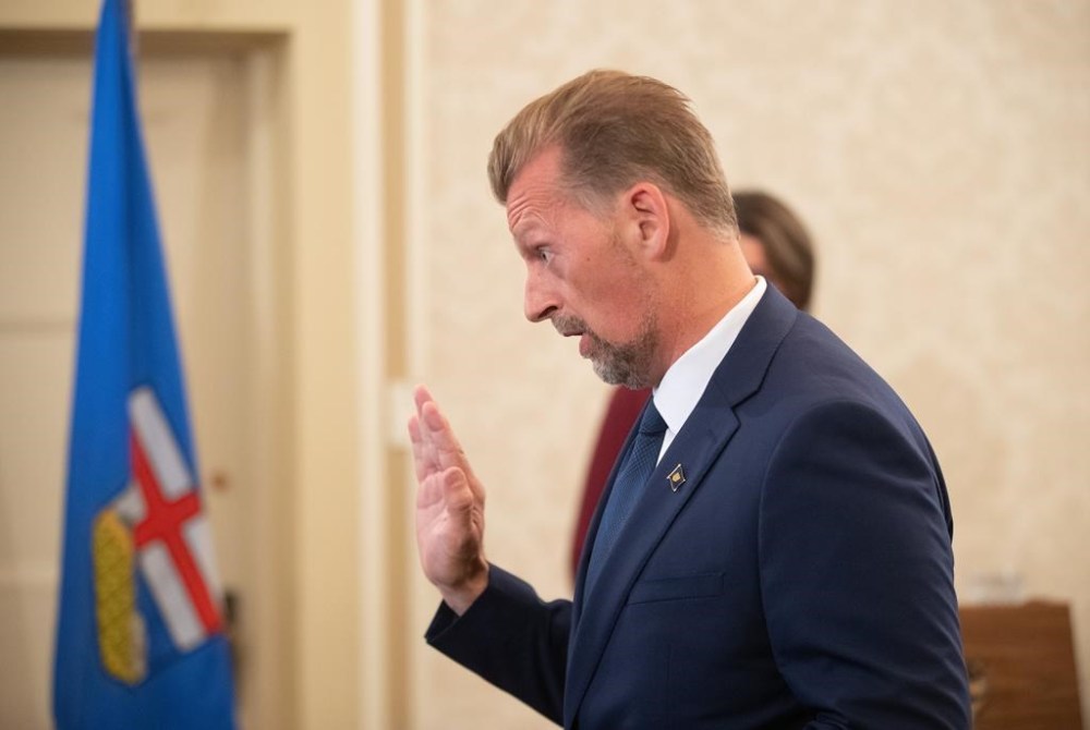 Public Safety Minster Mike Ellis is sworn into cabinet in Edmonton on Friday, June 9, 2023. The Alberta government is partnering with community groups and putting up $4 million over two years to create an office to combat human trafficking. THE CANADIAN PRESS/Jason Franson