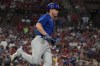 Chicago Cubs' Patrick Wisdom rounds the bases after hitting a solo home run during the fifth inning of a baseball game against the St. Louis Cardinals Friday, July 28, 2023, in St. Louis. (AP Photo/Jeff Roberson)