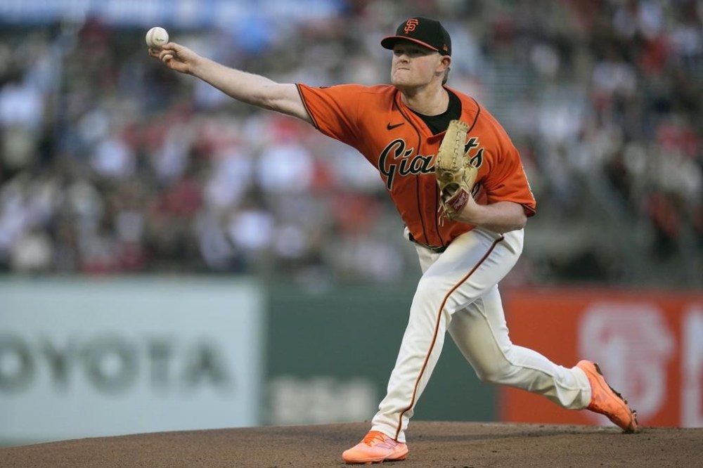 San Francisco Giants pitcher Logan Webb works against the Boston Red Sox during the first inning of a baseball game in San Francisco, Friday, July 28, 2023. (AP Photo/Jeff Chiu)