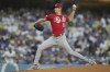 Cincinnati Reds starting pitcher Brandon Williamson (55) throws during the first inningof a baseball game against the Los Angeles Dodgers in Los Angeles, Friday, July 28, 2023. (AP Photo/Ashley Landis)
