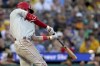 Philadelphia Phillies' Brandon Marsh hits an RBI double against the Pittsburgh Pirates during the fourth inning of a baseball game in Pittsburgh, Saturday, July 29, 2023. (AP Photo/Matt Freed)