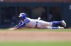 Atlanta Braves' Ronald Acuna Jr. steals second base during the third inning of a baseball game against the Milwaukee Brewers, Sunday, July 30, 2023, in Atlanta. (AP Photo/Todd Kirkland)