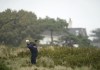 Ireland's Padraig Harrington plays from the rough on the ninth during day four of the Senior Open Championship at the Royal Porthcawl Golf Course, Porthcawl, in Wales, Sunday July 30, 2023. (Nick Potts/PA via AP)