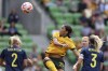 Australia's Sam Kerr, center, heads the ball between Sweden's Linda Sembrant, right, and Jonna Andersson during their women's friendly soccer match in Melbourne, Australia, Saturday, Nov. 12, 2022. THE CANADIAN PRESS/Asanka Brendon Ratnayake