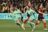 Australia's Steph Catley, foreground, celebrates after scoring her side's fourth goal from the penalty spot during the Women's World Cup Group B soccer match between Australia and Canada in Melbourne, Australia, Monday, July 31, 2023. (AP Photo/Hamish Blair)