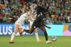 Ireland's Ruesha Littlejohn, left, battle for the ball with Nigeria's Antionette Payne during the Women's World Cup Group B soccer match between Ireland and Nigeria in Brisbane, Australia, Monday, July 31, 2023. (AP Photo/Tertius Pickard)