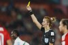 Referee Bouchra Karboubi shows a yellow card to Costa Rica's Katherine Alvarado, not pictured, during the Women's World Cup Group C soccer match between Costa Rica and Zambia in Hamilton, New Zealand, Monday, July 31, 2023. (AP Photo/Abbie Parr)