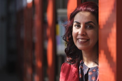 Zarqa Nawaz poses for a photo at the Regina Public Library in Regina, Wednesday, Feb. 23, 2022. Nawaz's novel 