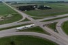 A transport truck hauling two trailers travels on the Trans-Canada Highway past Hwy 5 west of Winnipeg near Carberry, Man., Friday, June 16, 2023. A multi-vehicle collision has been reported at the same intersection in southwestern Manitoba where a minibus carrying seniors crashed in mid-June, claiming 17 lives. THE CANADIAN PRESS/Darryl Dyck