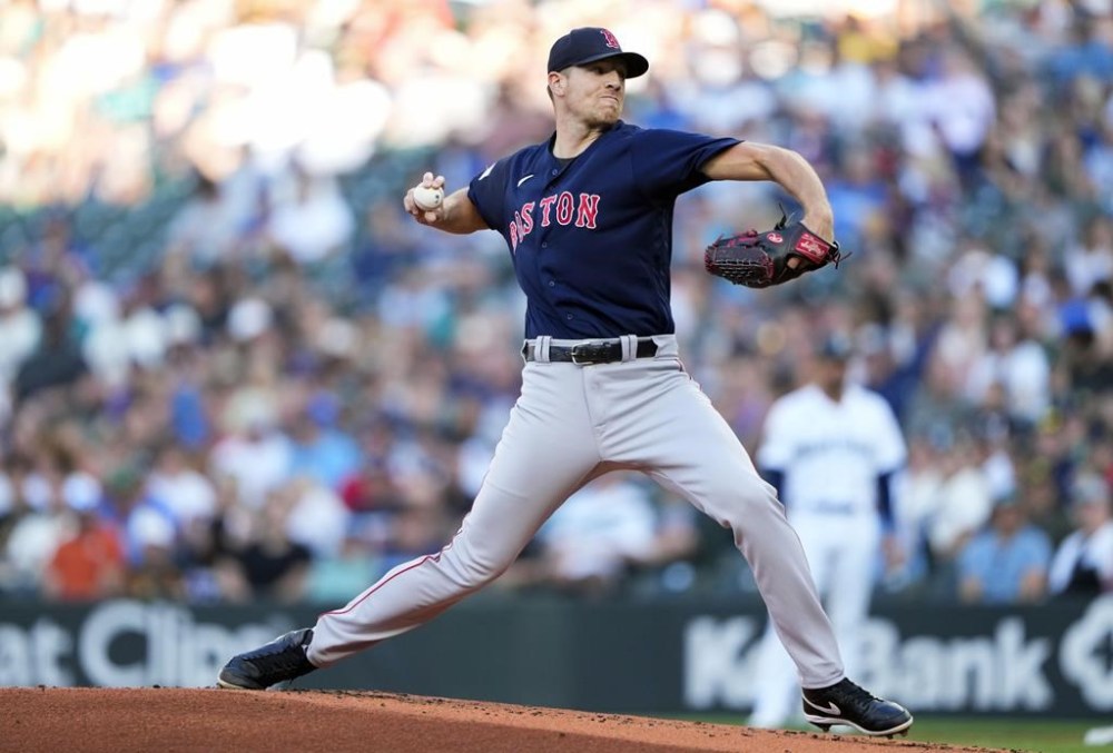 Boston Red Sox starting pitcher Nick Pivetta throws against the Seattle Mariners during the first inning of a baseball game, Monday, July 31, 2023, in Seattle. (AP Photo/Lindsey Wasson)