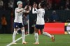 United States' Megan Rapinoe, left, replaces teammate Sophia Smith during the Women's World Cup Group E soccer match between Portugal and the United States at Eden Park in Auckland, New Zealand, Tuesday, Aug. 1, 2023. (AP Photo/Andrew Cornaga)