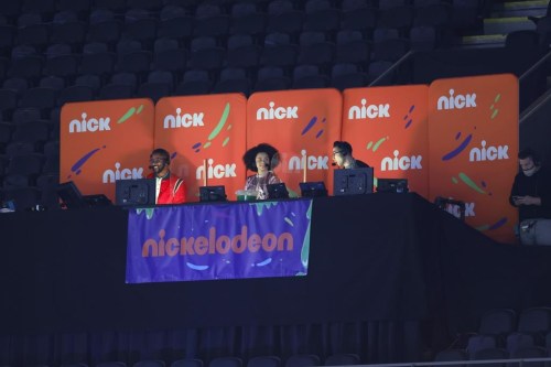 FILE - Nickelodeon commentators Nate Burleson, Gabrielle Nevaeh Green, and Noah Eagle are seen during an NFL wild-card playoff football between the New Orleans Saints and the Chicago Bears, Sunday, Jan. 10, 2021, in New Orleans. SpongeBob and Slimetime are coming to the Super Bowl. The NFL and CBS Sports announced Tuesday morning, Aug. 1, 2023, that this season’s Super Bowl will have a kids-centric presentation on Nickelodeon, marking the first time the Super Bowl has had an alternate telecast on another network.(AP Photo/Tyler Kaufman, File)