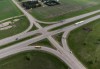 A scorched patch of ground where a bus carrying seniors ended up after colliding with a transport truck and burning is seen on the edge of the Trans-Canada Highway where it intersects with Hwy 5, west of Winnipeg near Carberry, Man., Friday, June 16, 2023. Manitoba Premier Heather Stefanson says the province will increase signage at the highway intersection where a crash between a minibus and transport truck killed 17 people in June. THE CANADIAN PRESS/Darryl Dyck