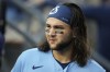 Blue Jays all-star shortstop Bo Bichette is day to day with right knee discomfort. Bichette walks in the dugout before a baseball game against the Los Angeles Dodgers, in Los Angeles, Tuesday, July 25, 2023. THE CANADIAN PRESS/AP-Marcio Jose Sanchez