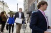 Former Hampton banker Russell Laffitte arrives with his defense team and family at the U.S. District Court for his sentencing in Charleston,S.C. on Tuesday, Aug 1, 2023. Laffitte, who once headed a highly respected bank in the South Carolina Lowcountry will spend seven years in federal prison for helping convicted murderer Alex Murdaugh steal nearly $2 million from clients' legal settlements. (Henry Taylor/The Post And Courier via AP)