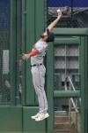 Detroit Tigers center fielder Riley Greene reaches for a triple hit by Pittsburgh Pirates' Endy Rodriguez during the second inning of a baseball game in Pittsburgh, Tuesday, Aug. 1, 2023. (AP Photo/Matt Freed)