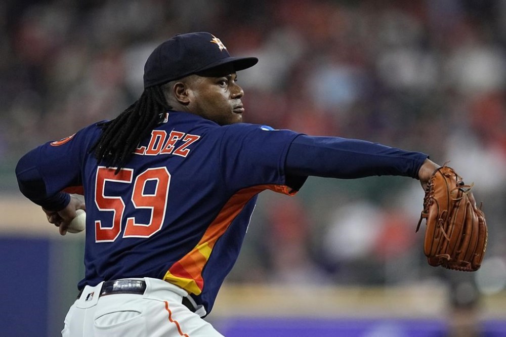 Houston Astros starting pitcher Framber Valdez delivers during the seventh inning of a baseball game against the Cleveland Guardians, Tuesday, Aug. 1, 2023, in Houston. (AP Photo/Kevin M. Cox)