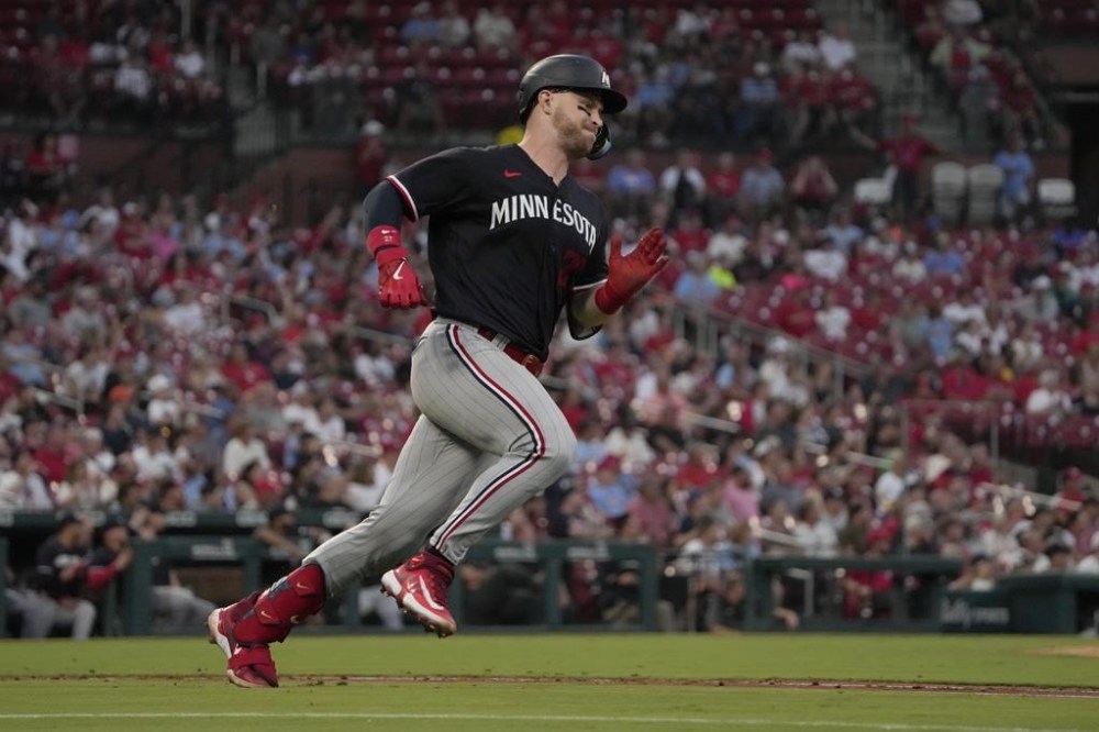 Minnesota Twins' Ryan Jeffers doubles during the fifth inning of a baseball game against the St. Louis Cardinals Tuesday, Aug. 1, 2023, in St. Louis. (AP Photo/Jeff Roberson)