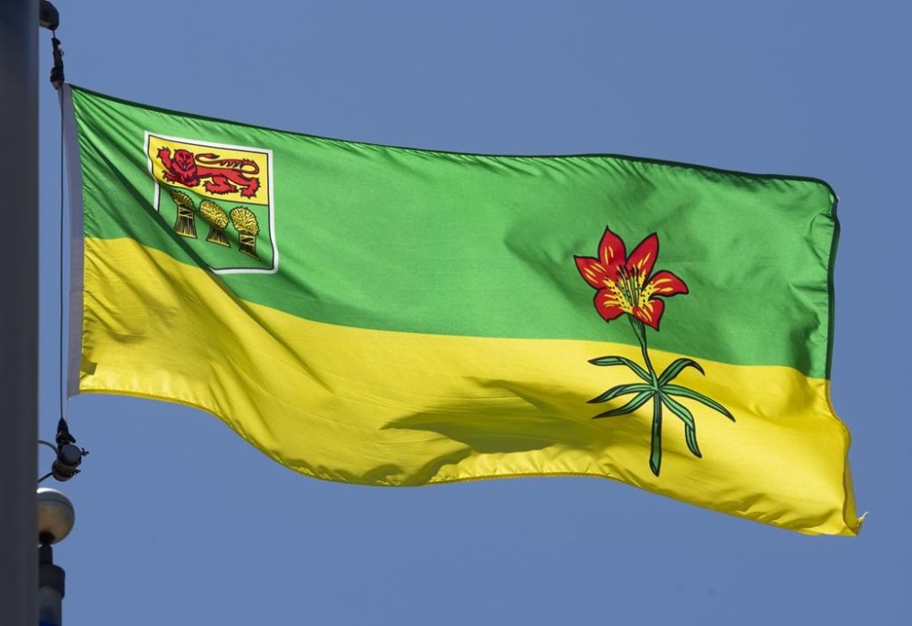 Saskatchewan's provincial flag flies on a flag pole in Ottawa, Monday July 6, 2020. An association of doctors in Saskatchewan is urging the provincial government to apply more caution when it comes to reopening schools.THE CANADIAN PRESS/Adrian Wyld
