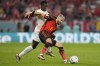 Canada's Richie Larye, left, and Belgium's Yannick Carrasco fight for the ball during the World Cup group F soccer match between Belgium and Canada, at the Ahmad Bin Ali Stadium in Doha, Qatar, Wednesday, Nov. 23, 2022. Larye has been loaned to the Vancouver Whitecaps by Nottingham Forest to the end of 2023, a source not authorized to speak on the record confirmed to The Canadian Press. THE CANADIAN PRESS/AP-Darko Bandic