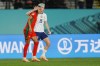 United States' Megan Rapinoe embraces Portugal's Jessica Silva, left, following the FIFA Women's World Cup Group E soccer match between Portugal and the United States at Eden Park in Auckland, New Zealand, Tuesday, Aug. 1, 2023. (AP Photo/Abbie Parr)