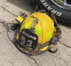 Logan Hope’s battered volunteer firefighter helmet, retrieved after he rescued a woman and together with her was briefly swept along a torrent flowing down Ellershouse Road, in Ellershouse, N.S., on Saturday, July 22, 2023, is shown in a handout photo. THE CANADIAN PRESS/HO-Doug Pynch **MANDATORY CREDIT**