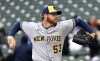 FILE -Milwaukee Brewers starting pitcher Brandon Woodruff (53) delivers during the first inning of a baseball game against the Chicago Cubs, Saturday, April 1, 2023, in Chicago. Milwaukee Brewers right-hander Brandon Woodruff appears on the verge of returning from the shoulder injury that has prevented the two-time All-Star from pitching in the majors since early April. (AP Photo/Quinn Harris, File)