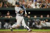 New York Yankees' Isiah Kiner-Falefa connects for a bases loaded double to bring in Aaron Judge, Giancarlo Stanton and Anthony Rizzo with runs during the sixth inning of a baseball game against the Baltimore Orioles, Saturday, July 29, 2023, in Baltimore. (AP Photo/Julio Cortez)
