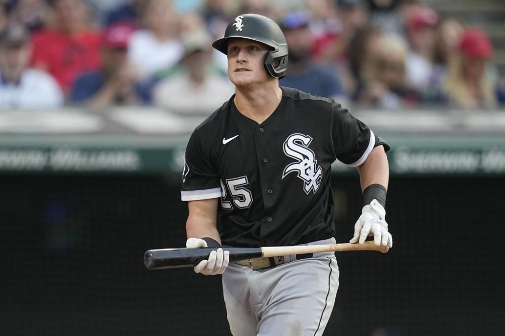 Chicago White Sox's Andrew Vaughn walks back to the dugout after striking out in the third inning of the team's baseball game against the Cleveland Guardians on Friday, Aug. 4, 2023, in Cleveland. (AP Photo/Sue Ogrocki)