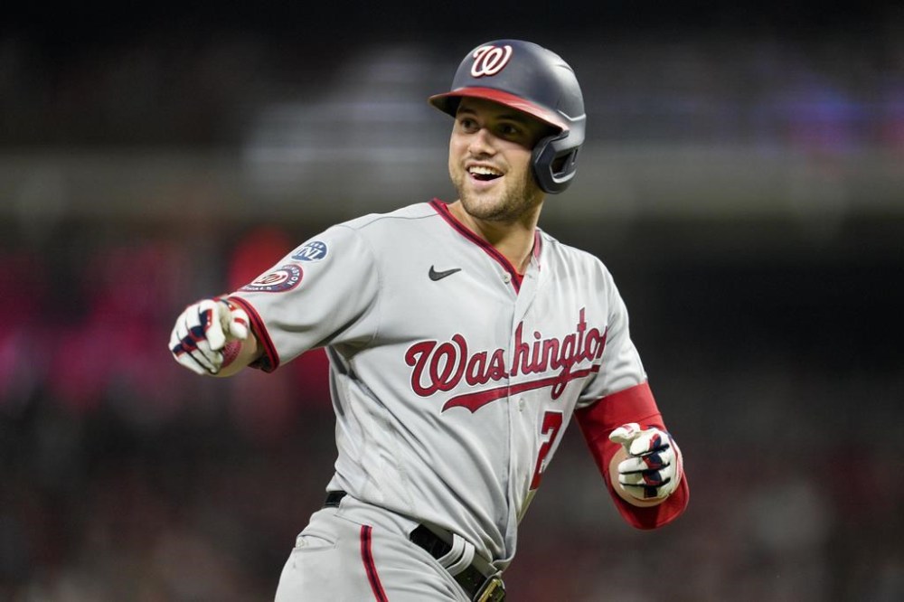 Washington Nationals' Lane Thomas rounds the bases after hitting a two-run home run against the Cincinnati Reds during the 10th inning of a baseball game Friday, Aug. 4, 2023, in Cincinnati. (AP Photo/Jeff Dean)