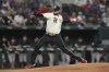 Texas Rangers starting pitcher Jordan Montgomery throws during the first inning of a baseball game against the Miami Marlins in Arlington, Texas, Friday, Aug. 4, 2023. (AP Photo/LM Otero)