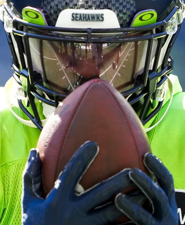 Seattle Seahawks cornerback Benjie Franklin catches a ball during warmups before the NFL football team's mock game, Friday, Aug. 4, 2023, in Seattle. (AP Photo/Lindsey Wasson)