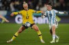 Sweden's Caroline Seger, left, and Argentina's Mariana Larroquette challenge for the ball during the Women's World Cup Group G soccer match between Argentina and Sweden in Hamilton, New Zealand, Wednesday, Aug. 2, 2023. (AP Photo/Abbie Parr)