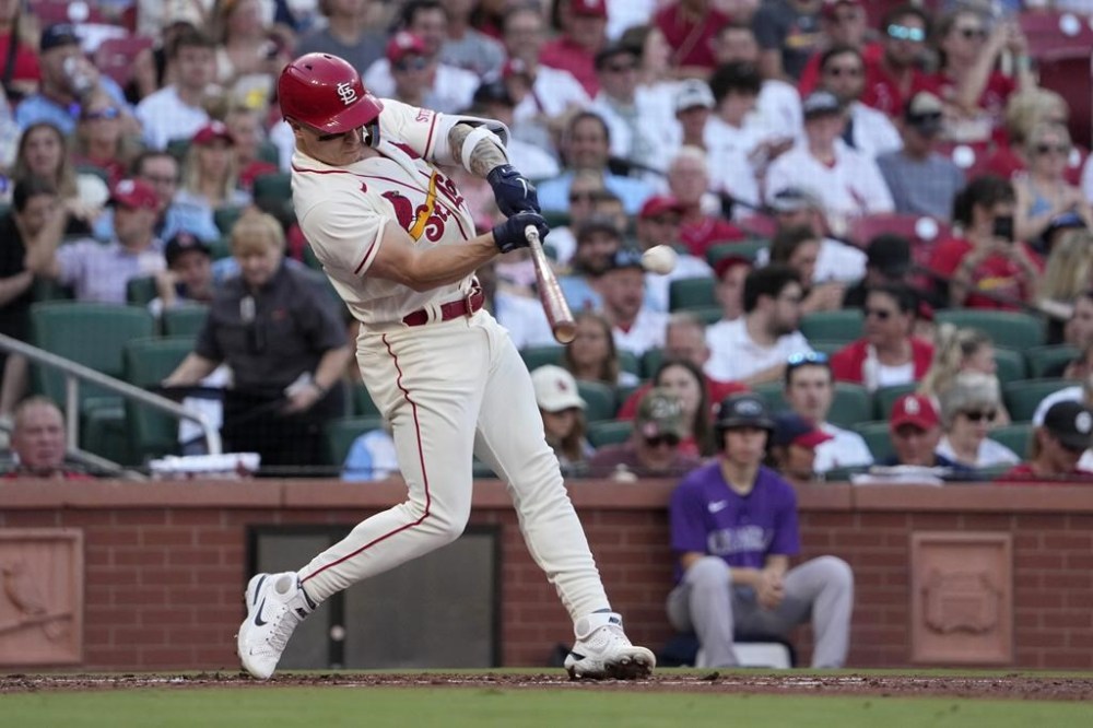 St. Louis Cardinals' Tyler O'Neill hits a solo home run during the second inning of a baseball game against the Colorado Rockies Saturday, Aug. 5, 2023, in St. Louis. (AP Photo/Jeff Roberson)